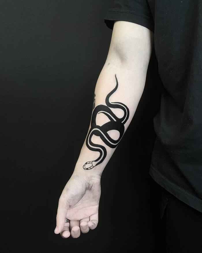 Close-up Image of the Simple Snake Blackwork Tattoo