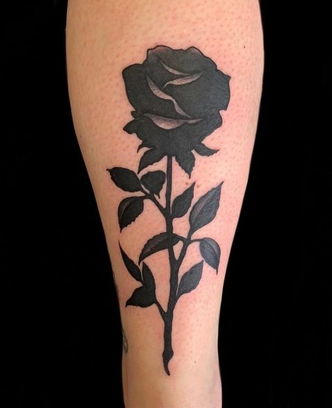 yellow rose with cross tattoos