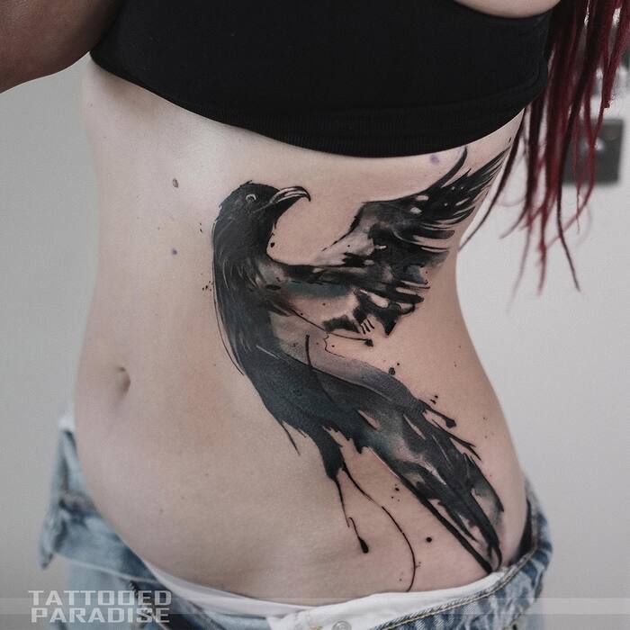 Watercolor tattoo of nordic raven in black and white inks