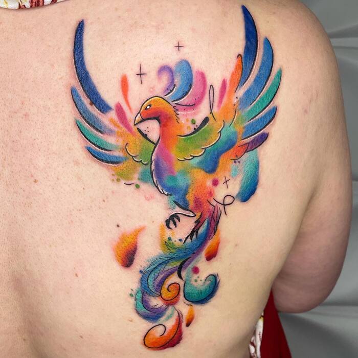 акварельная татуировка феникса на спине