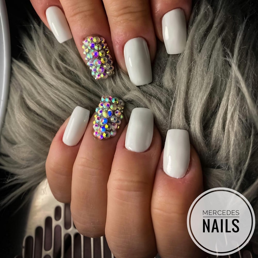 White Nails With Crystals on Ring Finger