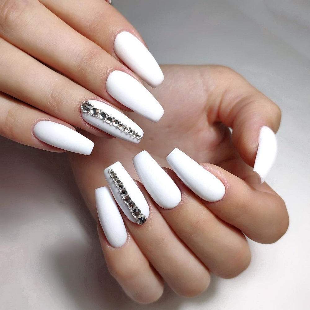 White Manicure With Crystal Stripes