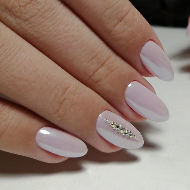 White nails with ring finger design  Ring finger nails, Diamond nails,  White acrylic nails