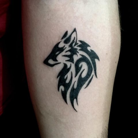 Minimalist Outline Wolf Tattoo