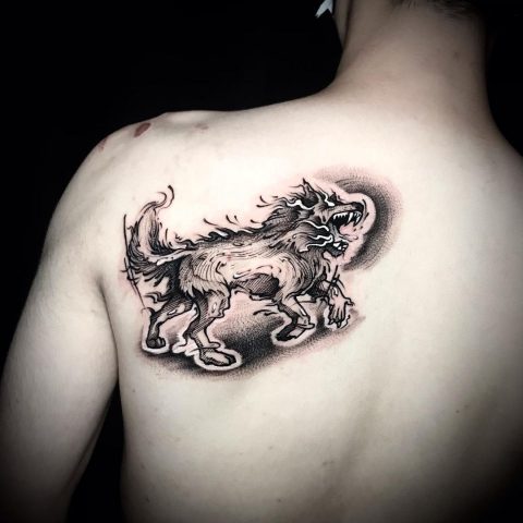 Laufendes Wolf-Tattoo